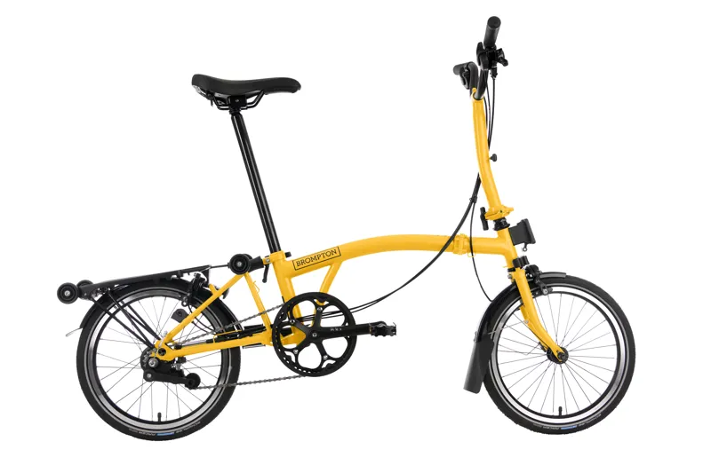 yellow brompton bike